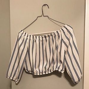 Off shoulder white shirt, black stripes